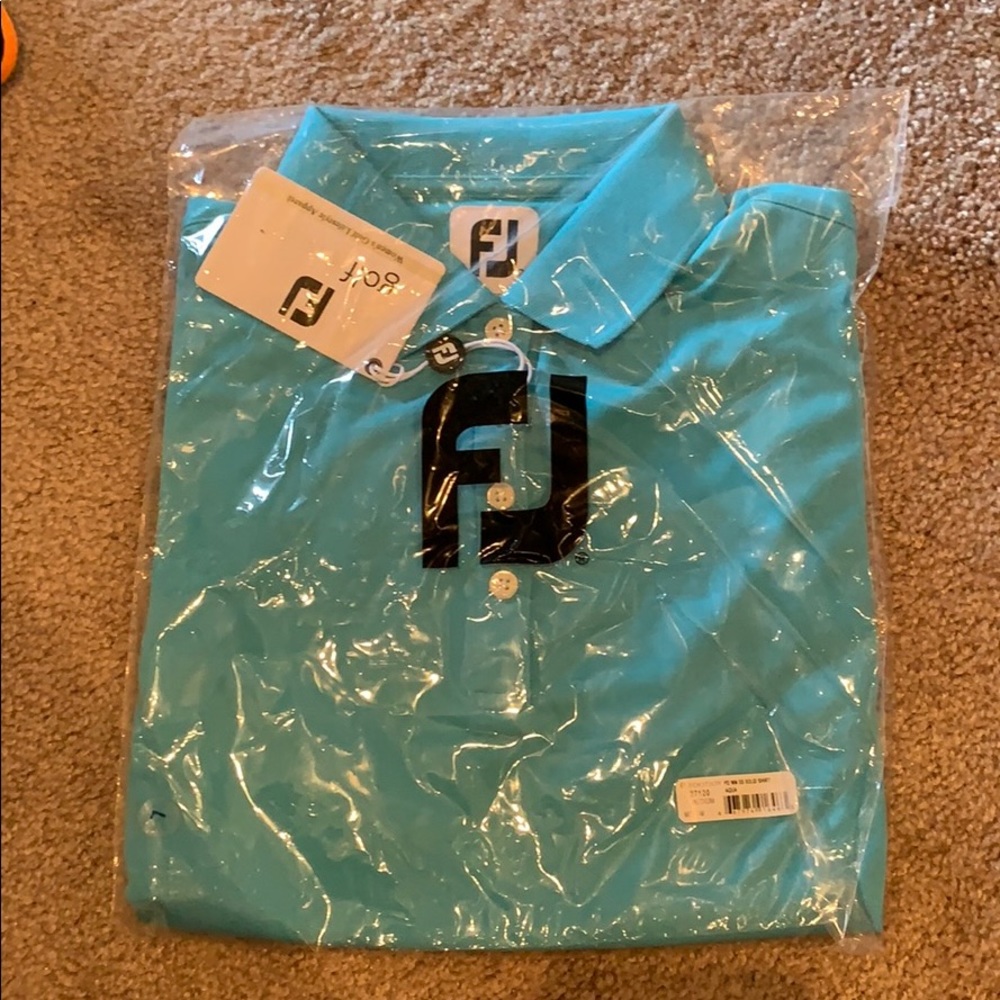 FJ women’s golf shirt in aqua size M. Brand new